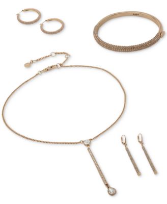 Линейные серьги-капли DKNY с микропавэ в золотистых тонах 