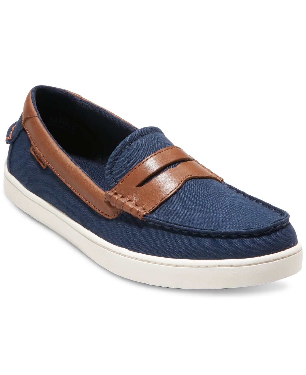 Shop Cole Haan Men's Nantucket Slip-on Penny Loafers In Navy Blazer Canvas,ch British Tan,ivory