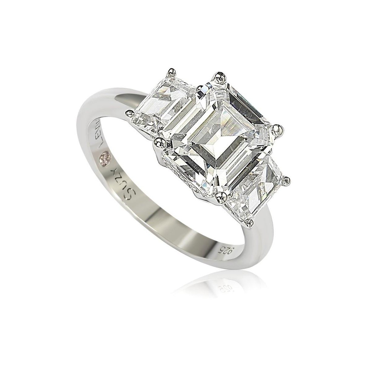 Украшения Suzy Levian New York Suzy Levian Sterling Silver Cubic Zirconia Emerald Cut 3.50cttw 3-Stone Center Stone Ring — фото 1