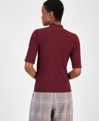 На 34-м женском топе с имитацией шеи и рукавами до локтя, созданном для Macy's