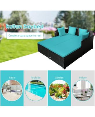 Spacious Outdoor Rattan Daybed with Upholstered Cushions and Pillows