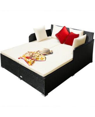 Spacious Outdoor Rattan Daybed with Upholstered Cushions and Pillows