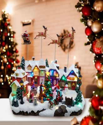 7.3-Inch Battery Operated Multicolor LED Lighted Musical Santa and Sleigh Table Piece