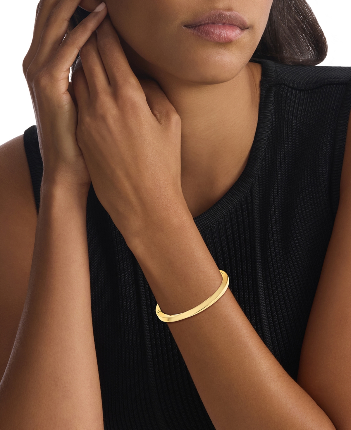 CALVIN KLEIN GOLD-TONE STAINLESS STEEL TWIST BANGLE BRACELET