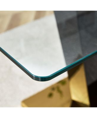 Table and chair set. A rectangular glass dining table with a 0.4-inch tempered glass tabletop and MDF board V-shaped bracket, paired with chairs consisting of PU seat cushions and black metal legs.