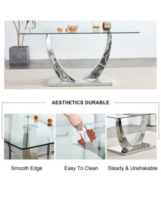 Table and chair set.Contemporary, minimalist rectangular dining table featuring a clear tempered glass top and sleek silver legs. Paired with chairs made of PU material cushion and silver metal legs.