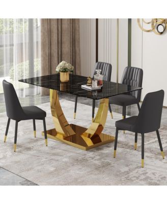 Table and chair set.Modern rectangular dining table with black textured stickers glass tabletop and gold plated metal legs.Paired with 4 comfortable chairs with PU seats and black metal legs.