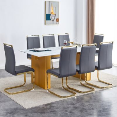 Table and chair set.Large modern rectangular table with 0.4 inch patterned glass tabletop and large MDF table legs.Comes with 8 chairs with faux leather cushioned seats and golden metal legs.