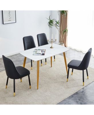 Table and chair set.A morden table with White imitation marble patterned stone burning tabletop with golden metal legs.Paired with 4 chairs with PU leather backrest and black metal legs.