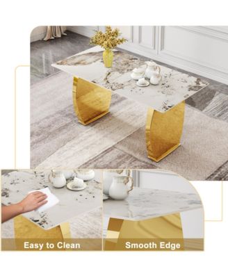 Table and chair set, rock plate table top, gold metal table legs, stable and beautiful, suitable for most home styles. Modern simple dining table, comfortable seating.