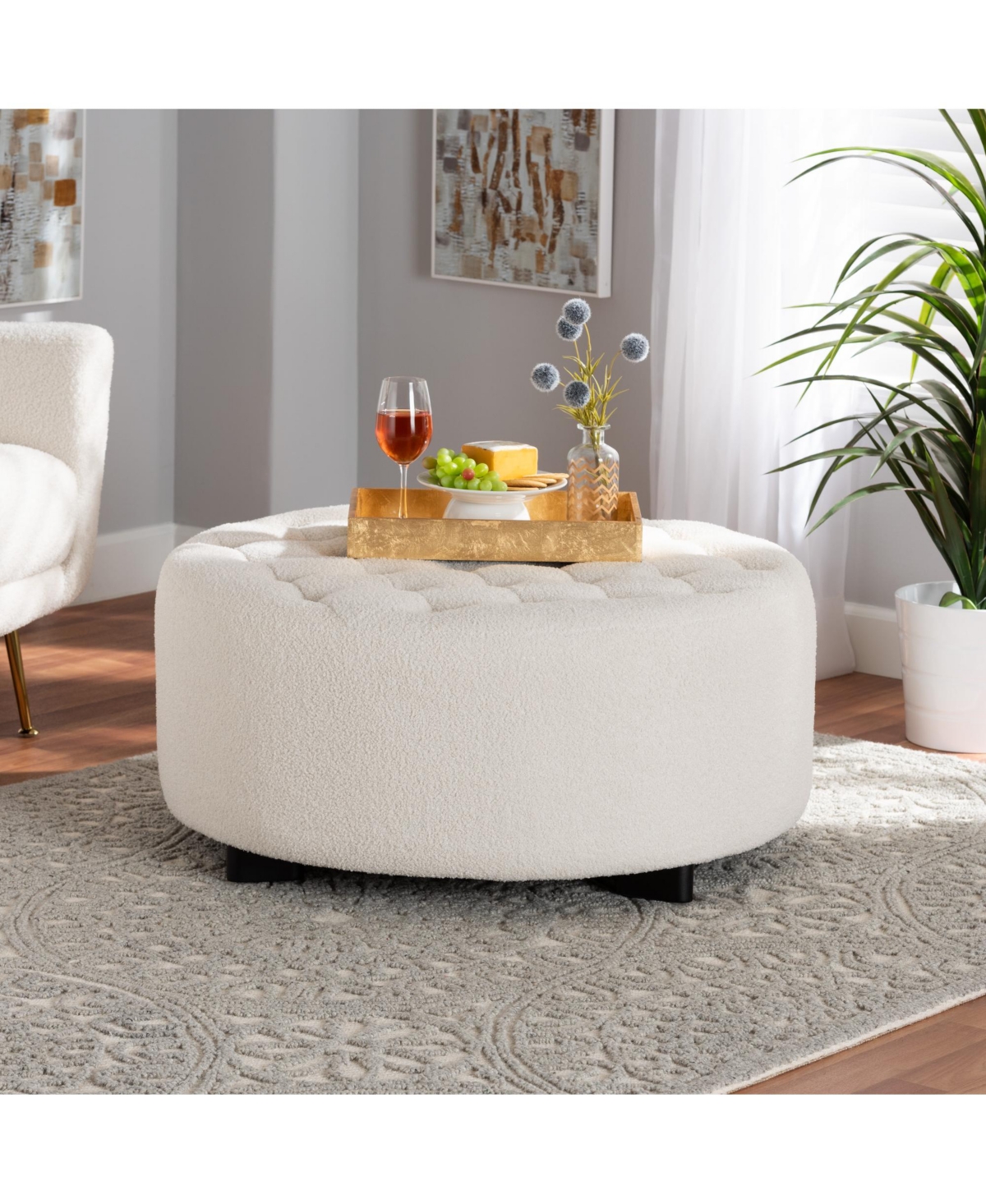 Baxton Studio Athena Modern and Contemporary Ivory Boucle Upholstered and Black Finished Wood Round Ottoman