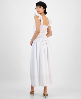 А теперь это миниатюрное макси-платье с круглым вырезом и рюшами