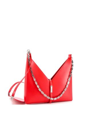 Бывшая в употреблении маленькая кожаная сумка Givenchy с вырезами