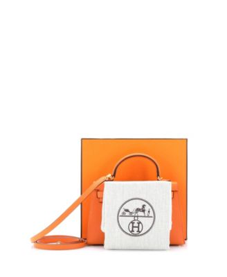 Бывшая в употреблении сумка HERMÉS Kelly 20 оранжевого цвета с золотой фурнитурой