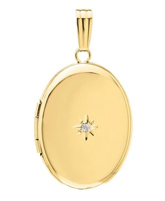 Женский полированный медальон диаметром 17 мм из желтого золота с бриллиантовыми вставками