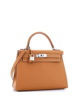 Бывшая в употреблении сумка HERMES Kelly 28 коричневого цвета с палладиевой фурнитурой