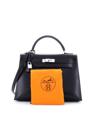 Бывшая в употреблении сумка HERMES Kelly 32 из телячьей кожи черного цвета с палладиевой фурнитурой