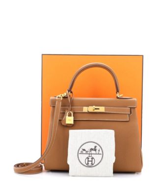 Бывшая в употреблении сумка HERMES Kelly 28 коричневого цвета из Того с золотой фурнитурой