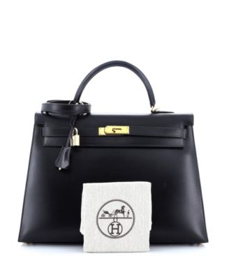 Бывшая в употреблении сумка HERMES Kelly 35 из телячьей кожи черного цвета с золотой фурнитурой