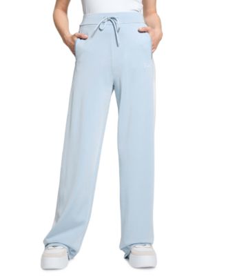 Женские трикотажные брюки GUESS с накладными карманами в боковую полоску