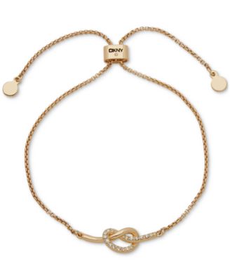 Браслет-слайдер DKNY с золотистым узлом Паве и акцентным ползунком