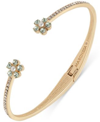 Золотистый браслет-манжета Marchesa с голубым камнем в цветочек на петлях 