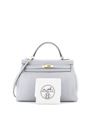 Бывшая в употреблении сумка Hermes Kelly 32 синего цвета из Того с золотой фурнитурой