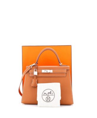 Бывшая в употреблении сумка Hermes Kelly 28 коричневого цвета с палладиевой фурнитурой