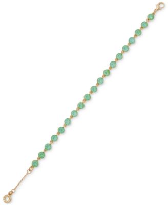 Гибкий браслет с плавающим цветным камнем Anne Klein золотистого цвета	