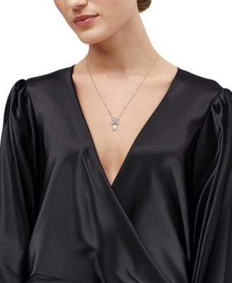 Cultured Freshwater Oval Pearl (7 - 7-1/2mm) & Lab Grown Diamond (1/2 ct. t.w.) Floral 18" Pendant Necklace in 14k Gold