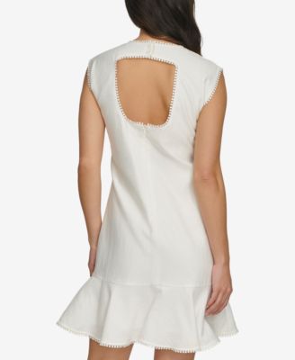 Женское платье с вышитыми помпонами и вырезом на спине от DKNY