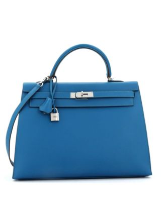 Бывшая в употреблении сумка Hermes Kelly 35 синего цвета с палладиевой фурнитурой