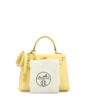 Бывшая в употреблении сумочка Hermes Kelly 25 желтого цвета с золотой фурнитурой