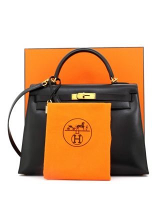 Бывшая в употреблении сумка Hermes Kelly 32 из телячьей кожи черного цвета с золотой фурнитурой