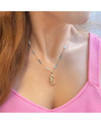 Очаровательный золотой амулет в виде морского конька из золота 14 Карат