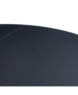 Streamdale A 42-inch burn stone round table with stainless steel legs can accommodate 4 or 6 diners