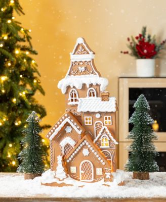 17.75" Lighted Resin Christmas Gingerbread House Figurine