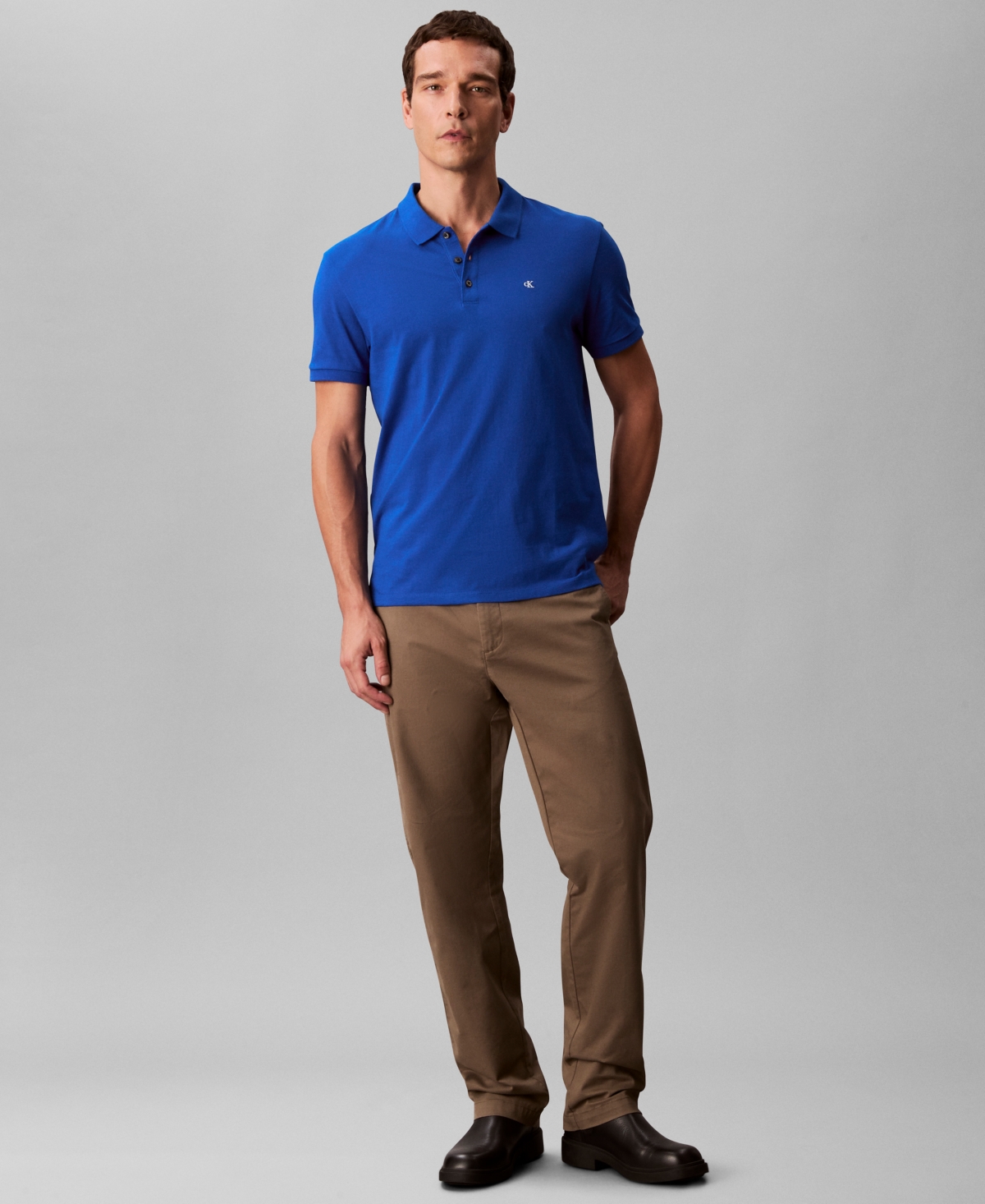Calvin Klein Men's Short Sleeve Solid Polo Shirt In Blue
