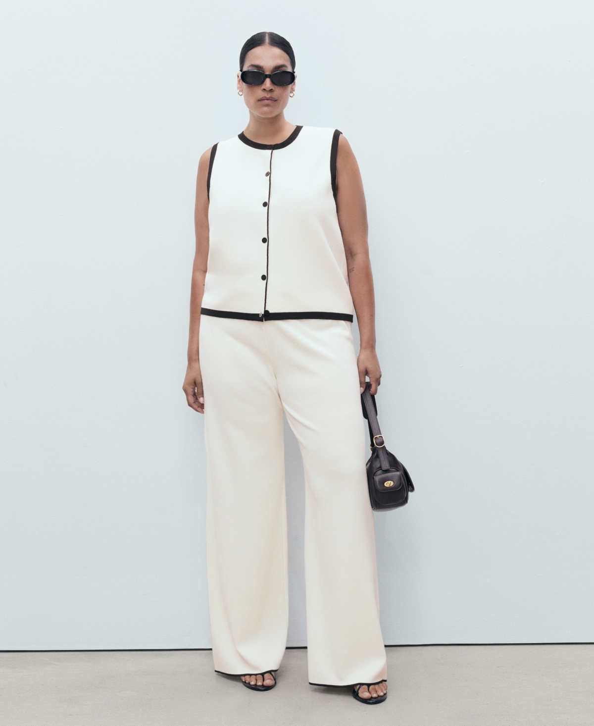 Mango Low Rise Contrast Hem Knit Pants In White