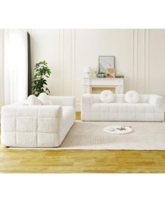 Modern Boneless Couch with Two Circular Throw Pillows
