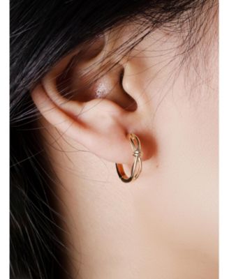 Love Knot Hoop Earrings in 14K Gold, approx. 2.3 grams.