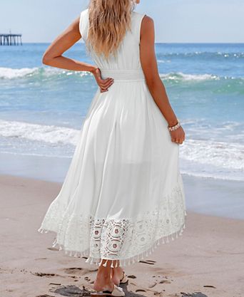 white dress for beach 100 Best Dresses ideas Details Cotton and synthetic fiber blend material Lightweight woven fabric A white dresses on the beach
