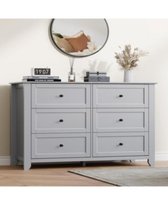 wooden construction features six deep drawers, metal knobs, and a wide 54-inch design, created as a modern dresser