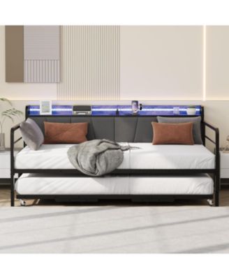 twin daybed with pop-up trundle, linen upholstery, storage headboard with charging ports, LED lights, and durable metal frame