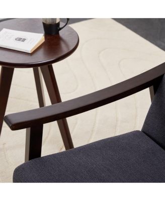 Modern medieval-inspired armchair with high back