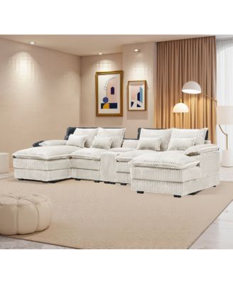 5-piece U-shaped sofa w/ console, USB ports & 4 pillows.