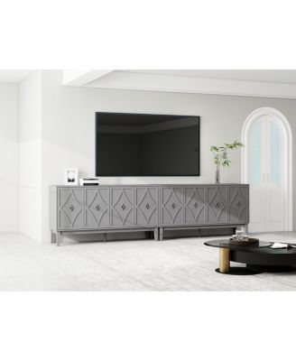 Vintage 4-door cabinet with hand-carved geometric doors and adjustable shelves