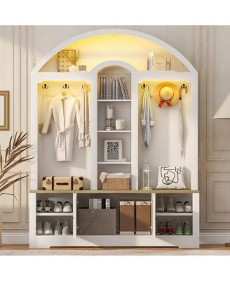 Multi-functional wardrobe with shoe racks, hangers, and hooks.