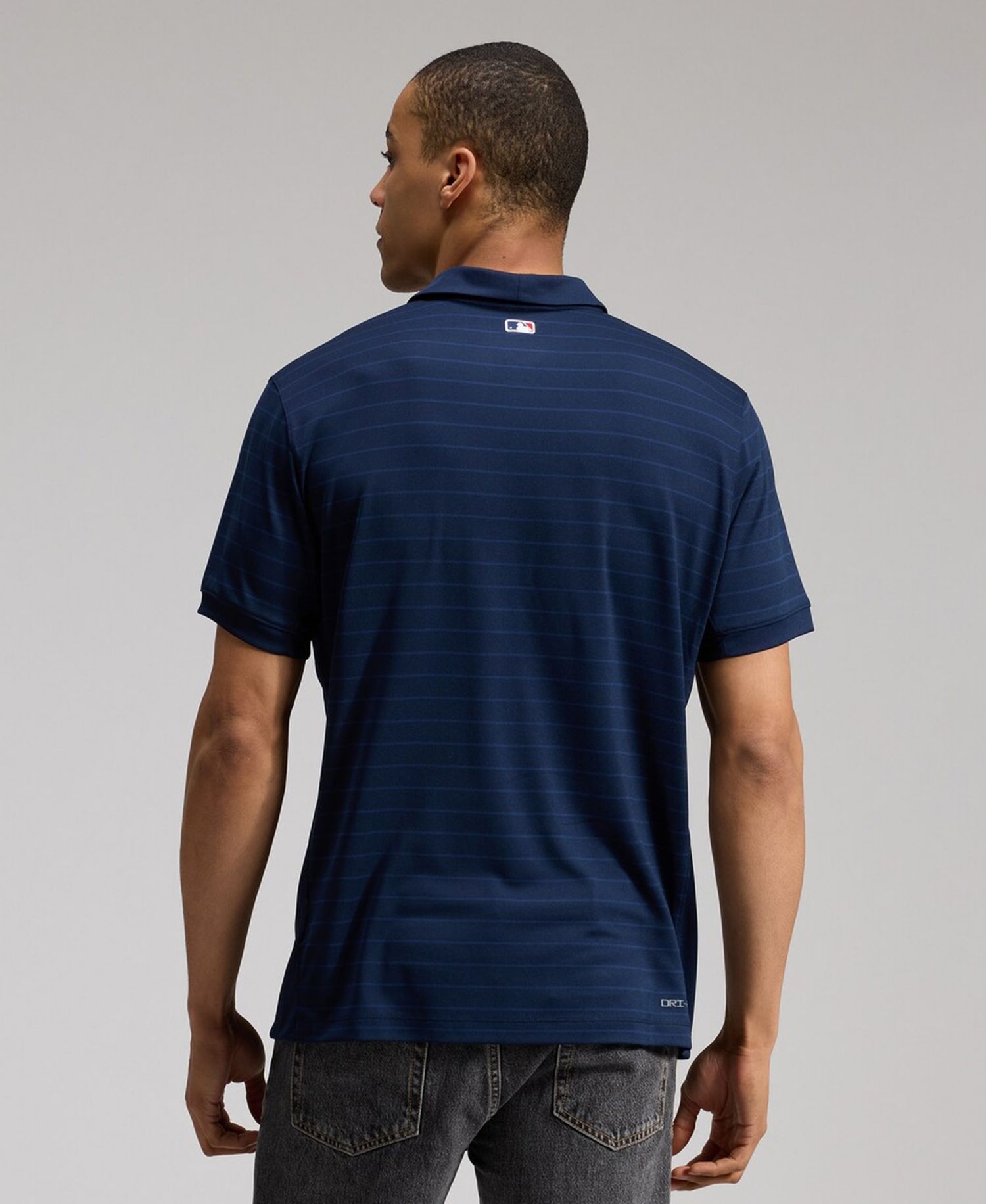 Men's Blue Atlanta Braves Authentic Collection Striped Victory Dri-FIT Polo Shirt
