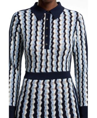 karen millen midi dress sale Dresses Sale Tulle Karen Millen Red Midi Dress A Woman Sitting At A Table  In Front Of The Ocean With People Eating And Drinking